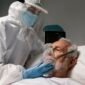 elderly man with respirator hospital bed 85x85